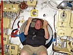 Todd Fowler crawling through a small hatch on the Russian
submarine