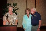 JJ Hogue presenting Jack & Pat Turley with a plaque in recognition for their years of service to the Richard S. Edwards Association from 2004 to 2010